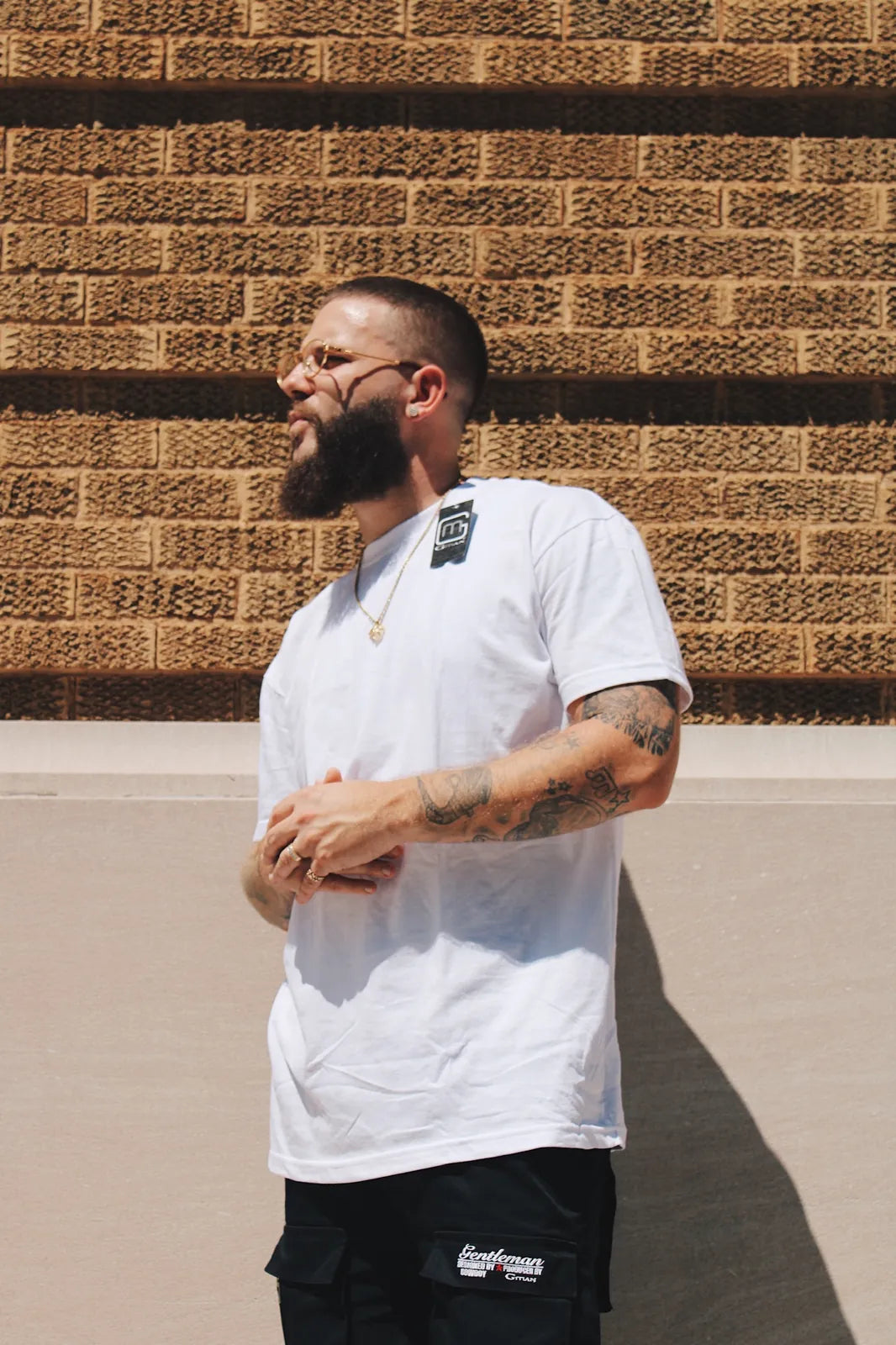 Man wearing Gman USA wholesale white t-shirt in Tampa, FL