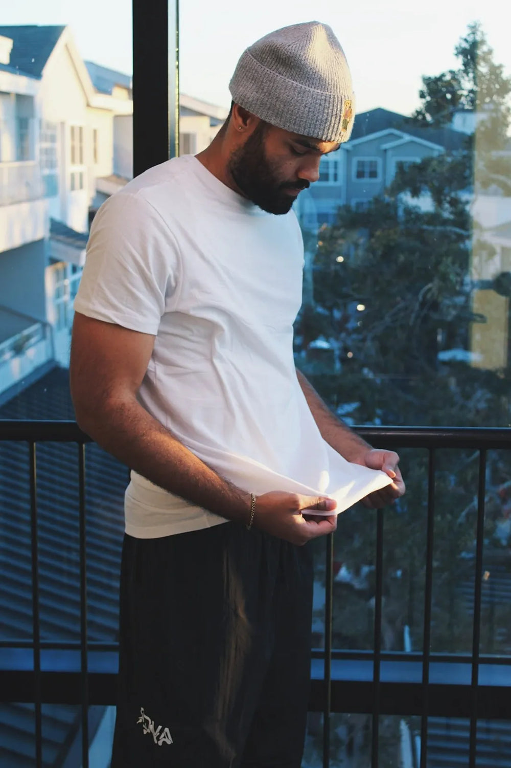 Man wearing Gman USA white t-shirt — premium cotton blend basics